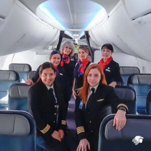 AeroMexico female Flight Attendants with Pilots.