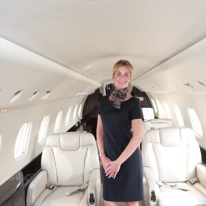 Luxaviation female VIP Cabin Crew member.