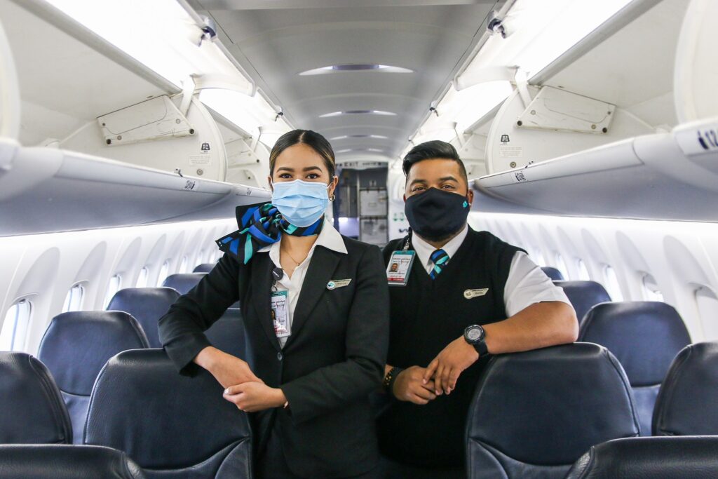 WestJet male and female Flight Attendants.