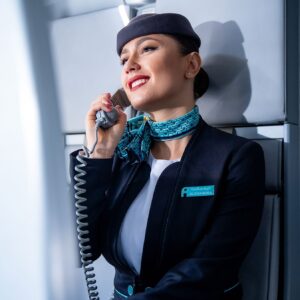 Flynas female Cabin Crew doing announcements.