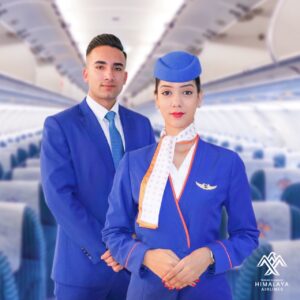 Himalaya Airlines male and female Cabin Crew inside the plane.