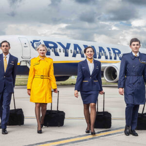 Ryanair male and female cabin crew on tarmac.