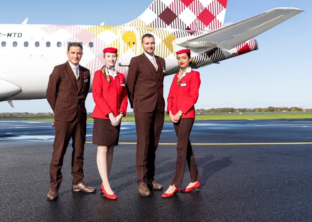 Volotea males and females Cabin Crew on tarmac.