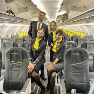 Vueling male and females Cabin Crew members.