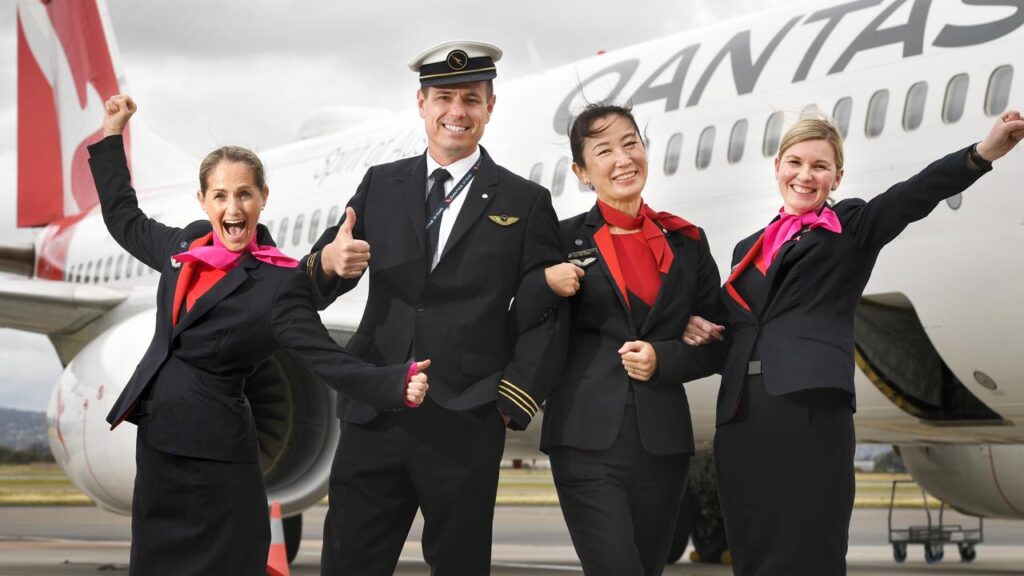 Qantas Cabin Crew and Captain.