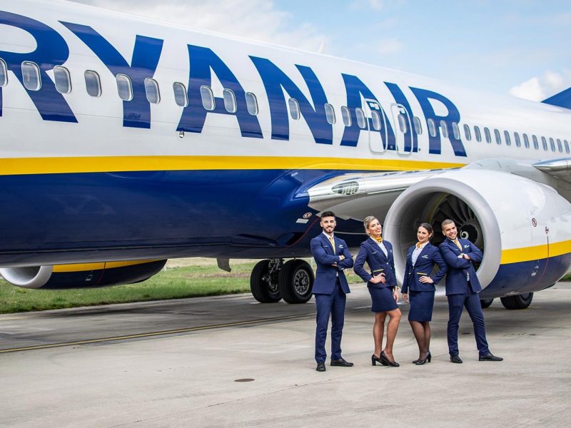 Ryanair Cabin Crew standing by the aircraft